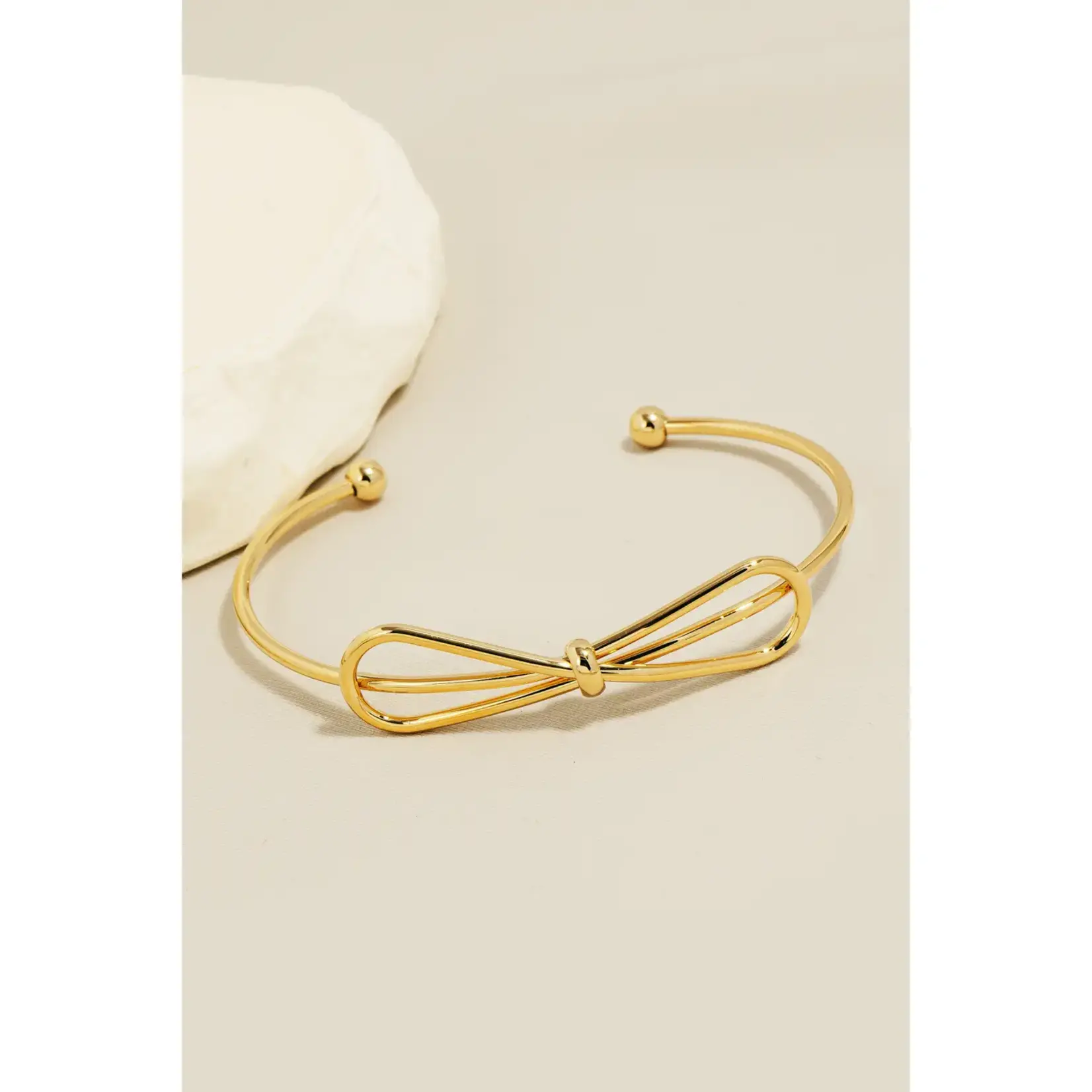 Ribbon Bow Metallic Cuff · Gold