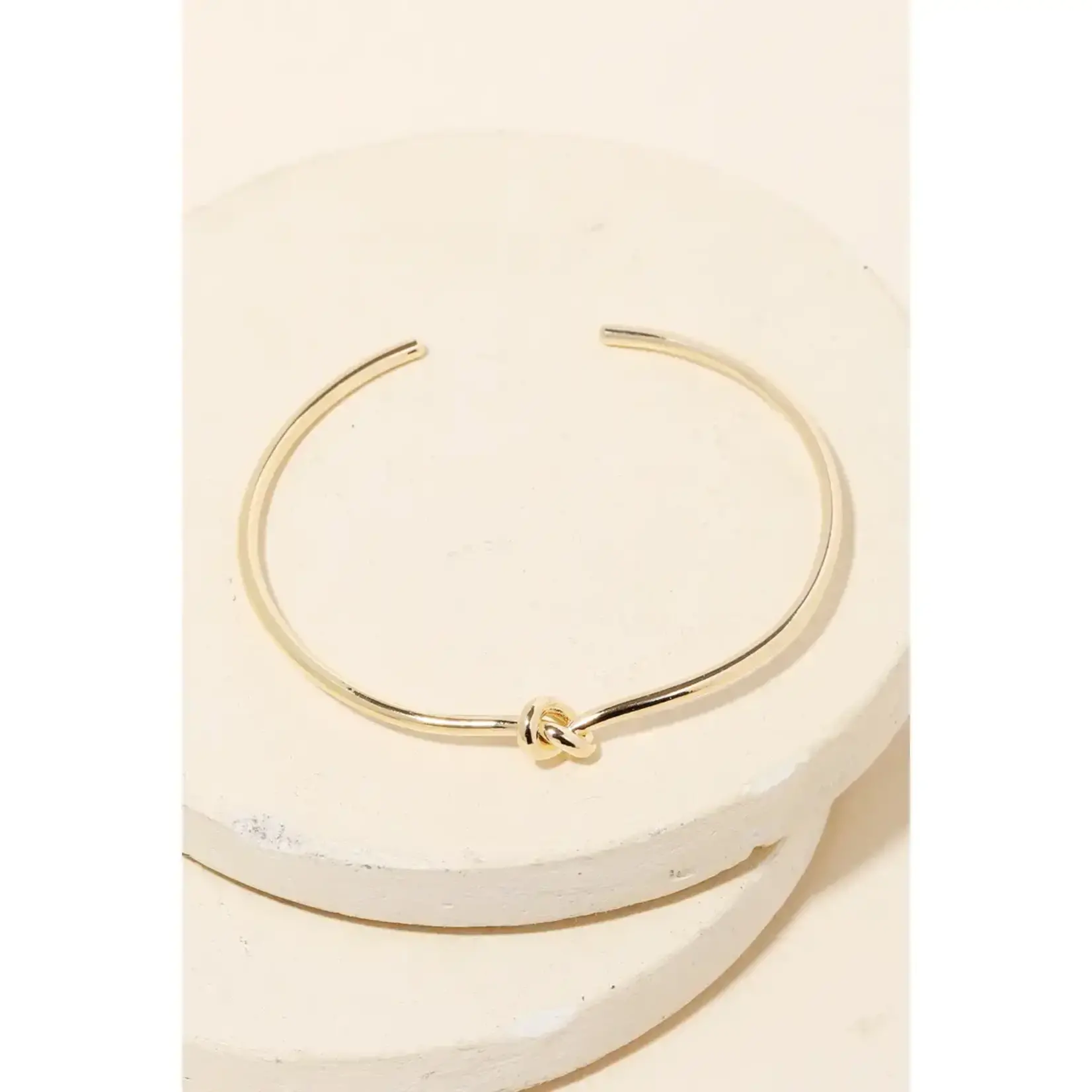 Metallic Knot Cuff Bracelet · Gold