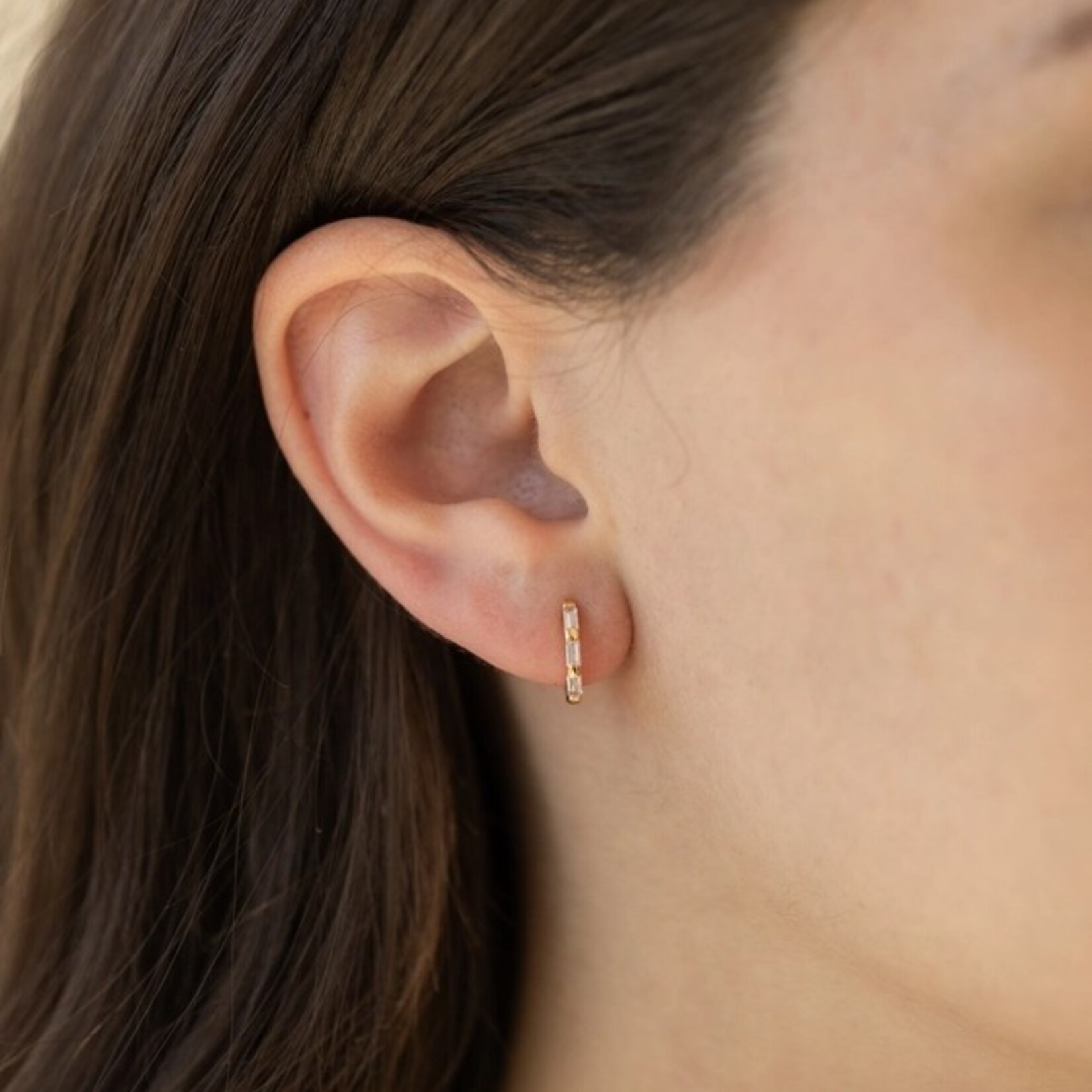 *Clear CZ Baguette Huggie Hoop Earrings · Gold