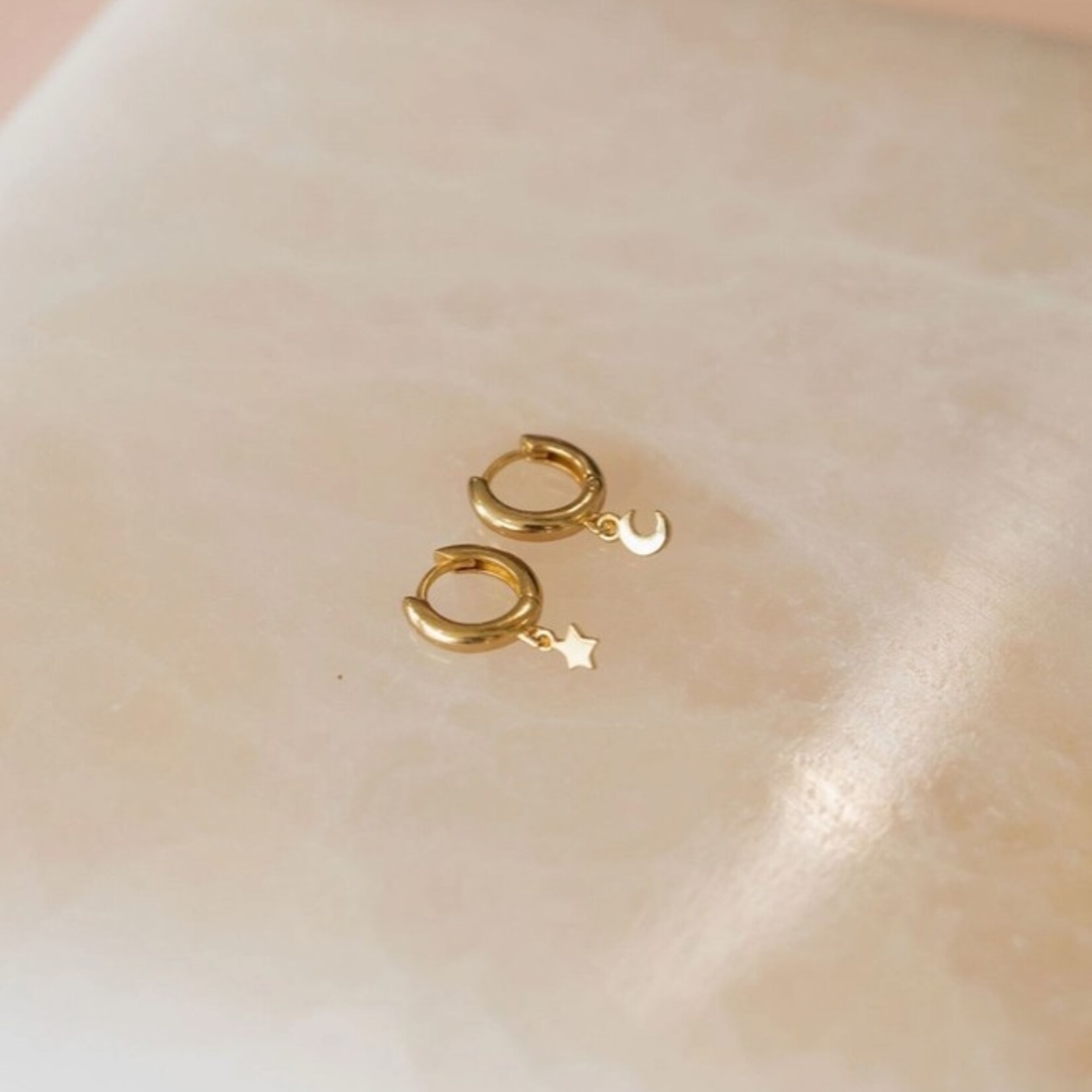 Star and Moon Huggie Hoop Earrings · Gold