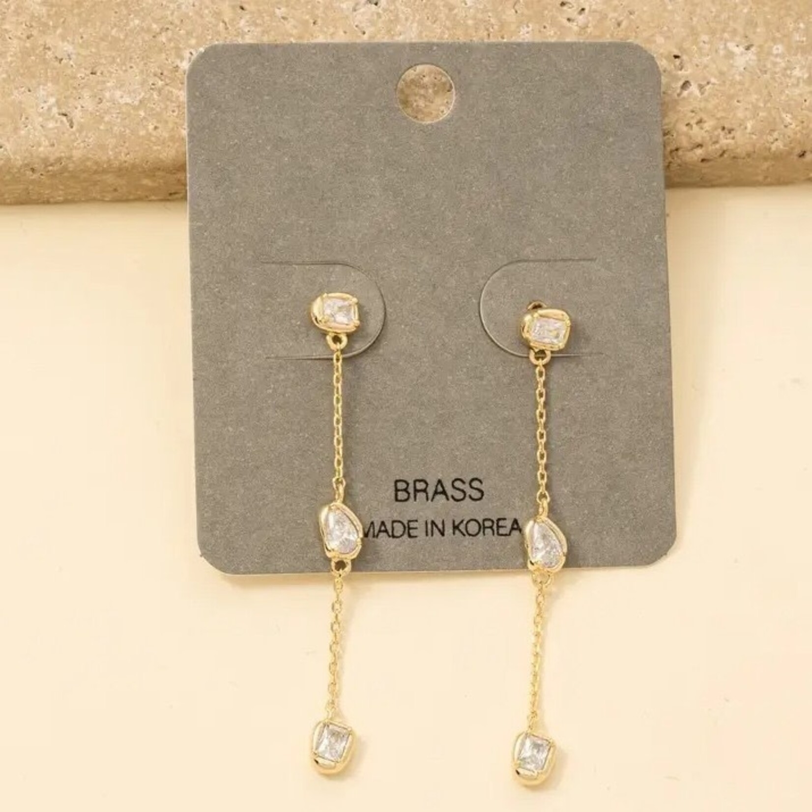 CZ Tear Drop Gem Chain Dangle Earrings · Gold