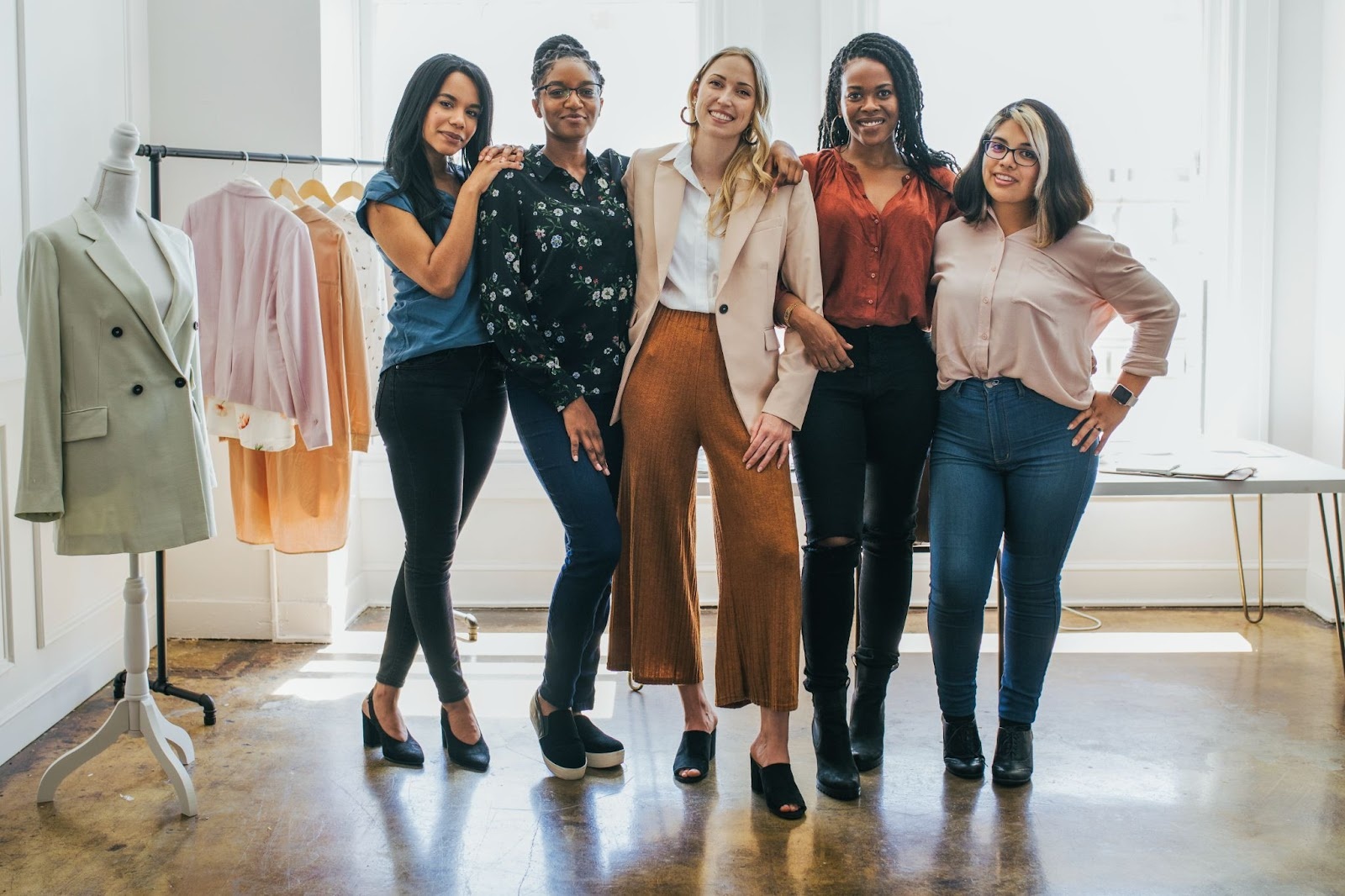 Five women in a clothing boutique