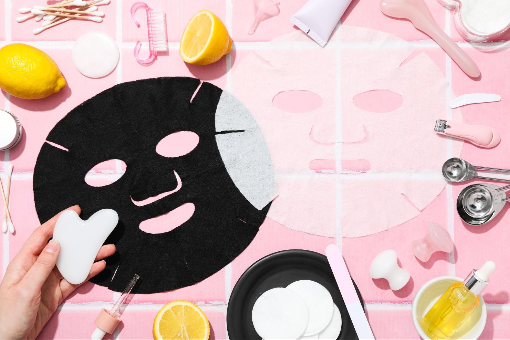 Sheet masks next to skincare products. 