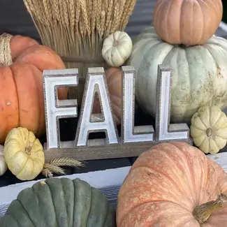 Carved ‘FALL’ on Base