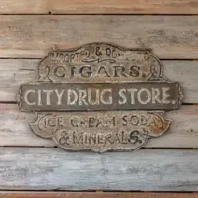 Embossed Metal Drug Store Sign