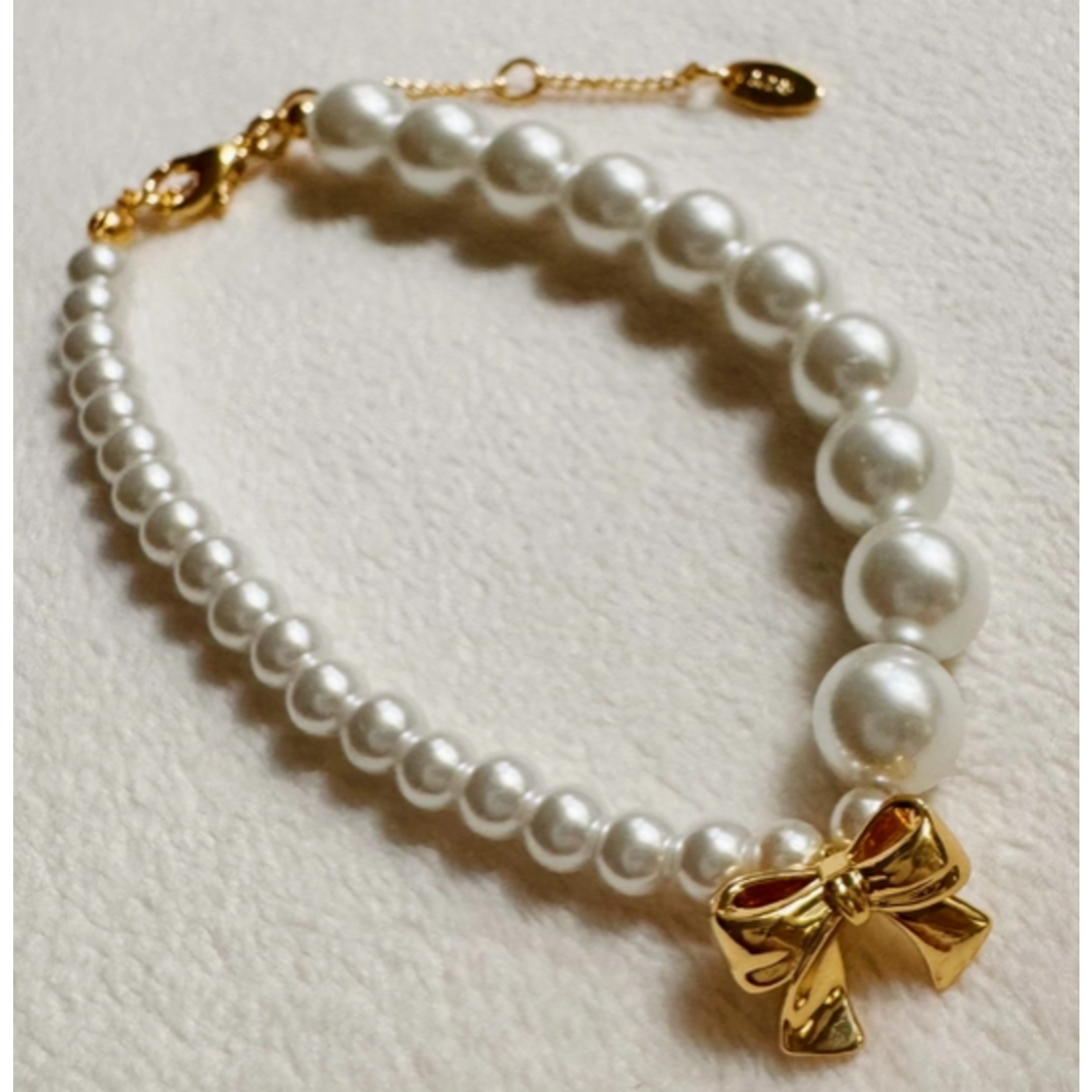 Ellison+Young E&Y Dangle Bow Pearl Bracelet
