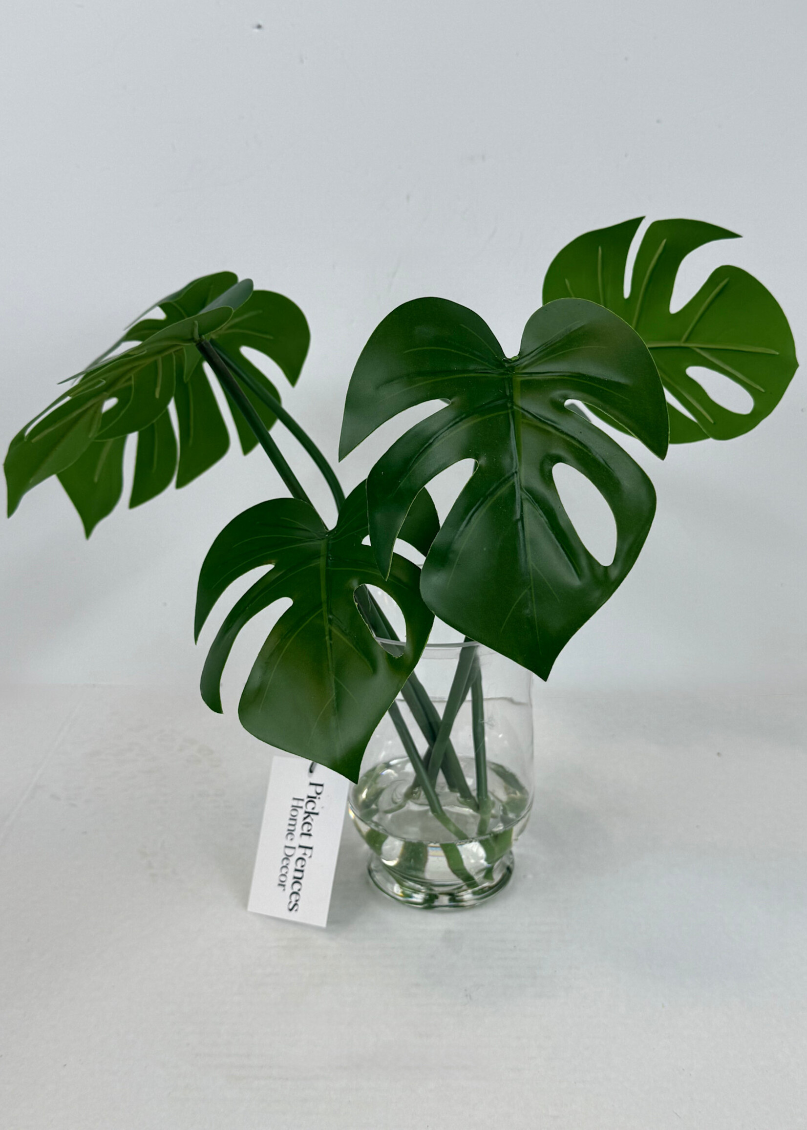 handcrafted floral Monstera Leaf Arrangement in Glass Vase
