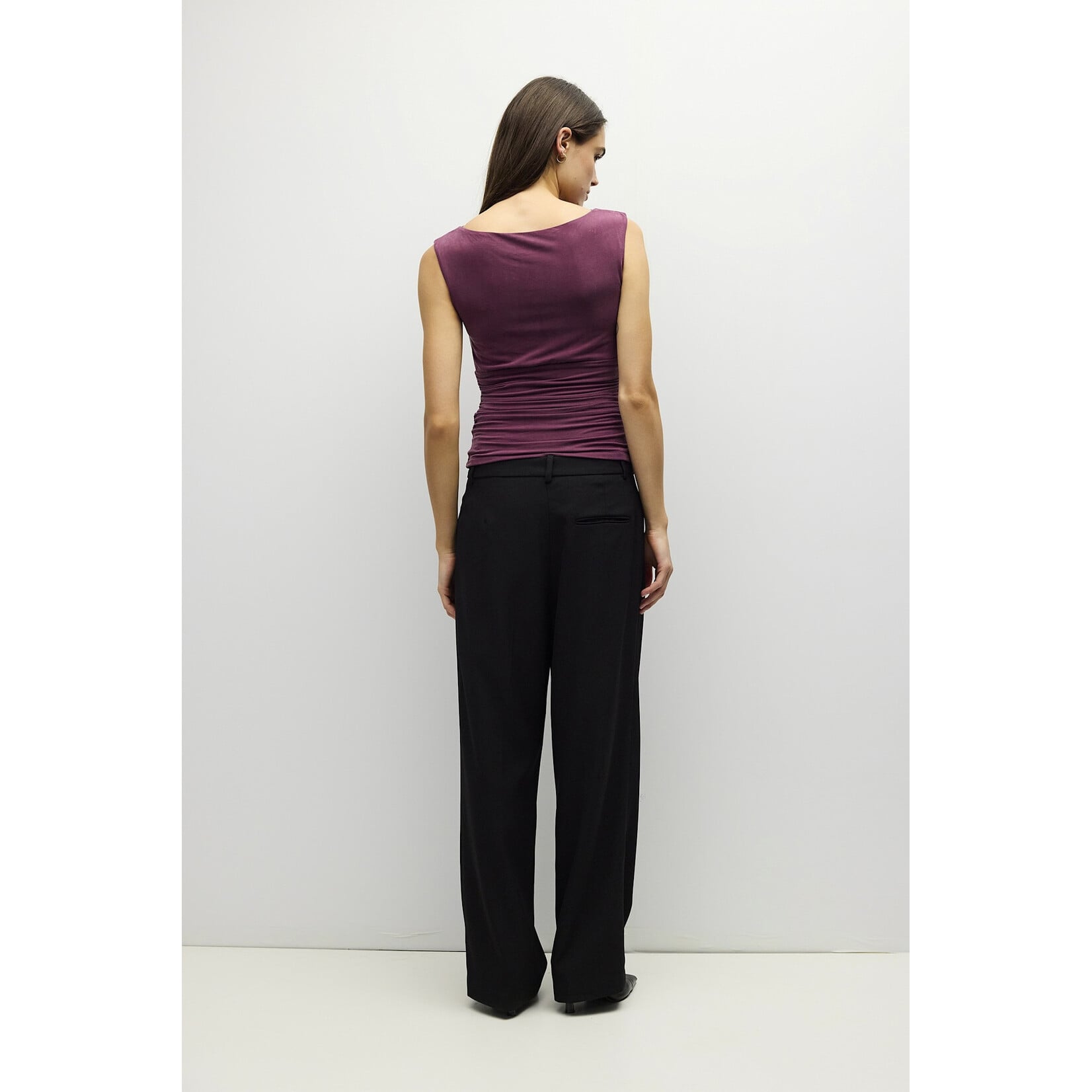 AVAILABLE IN PLUM, BLACK, AND BROWN