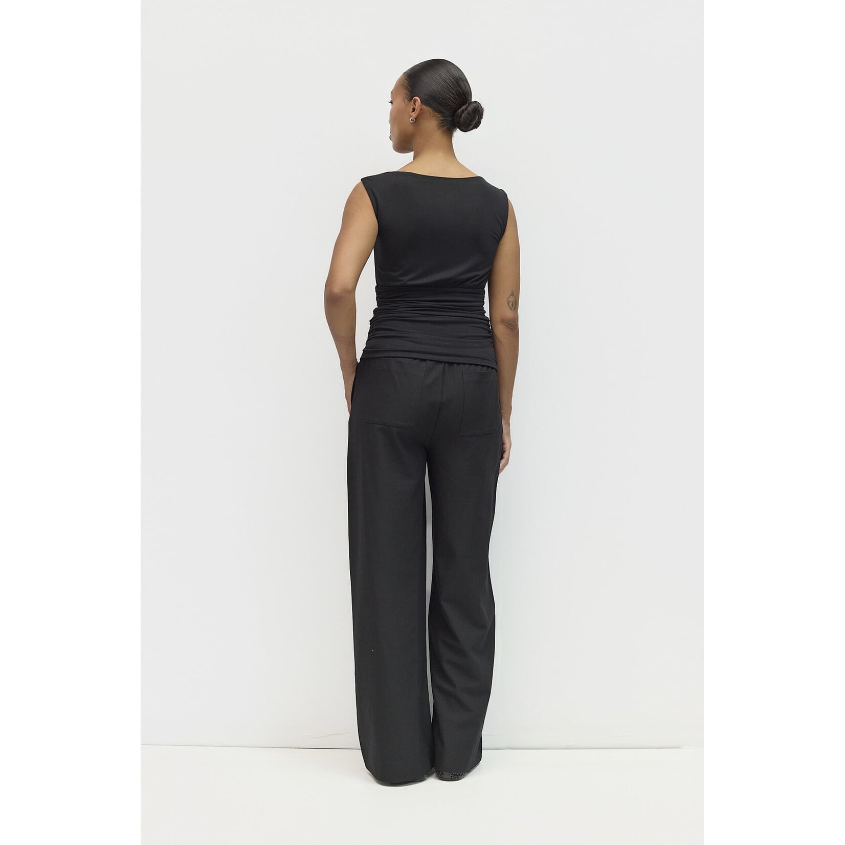 AVAILABLE IN PLUM, BLACK, AND BROWN