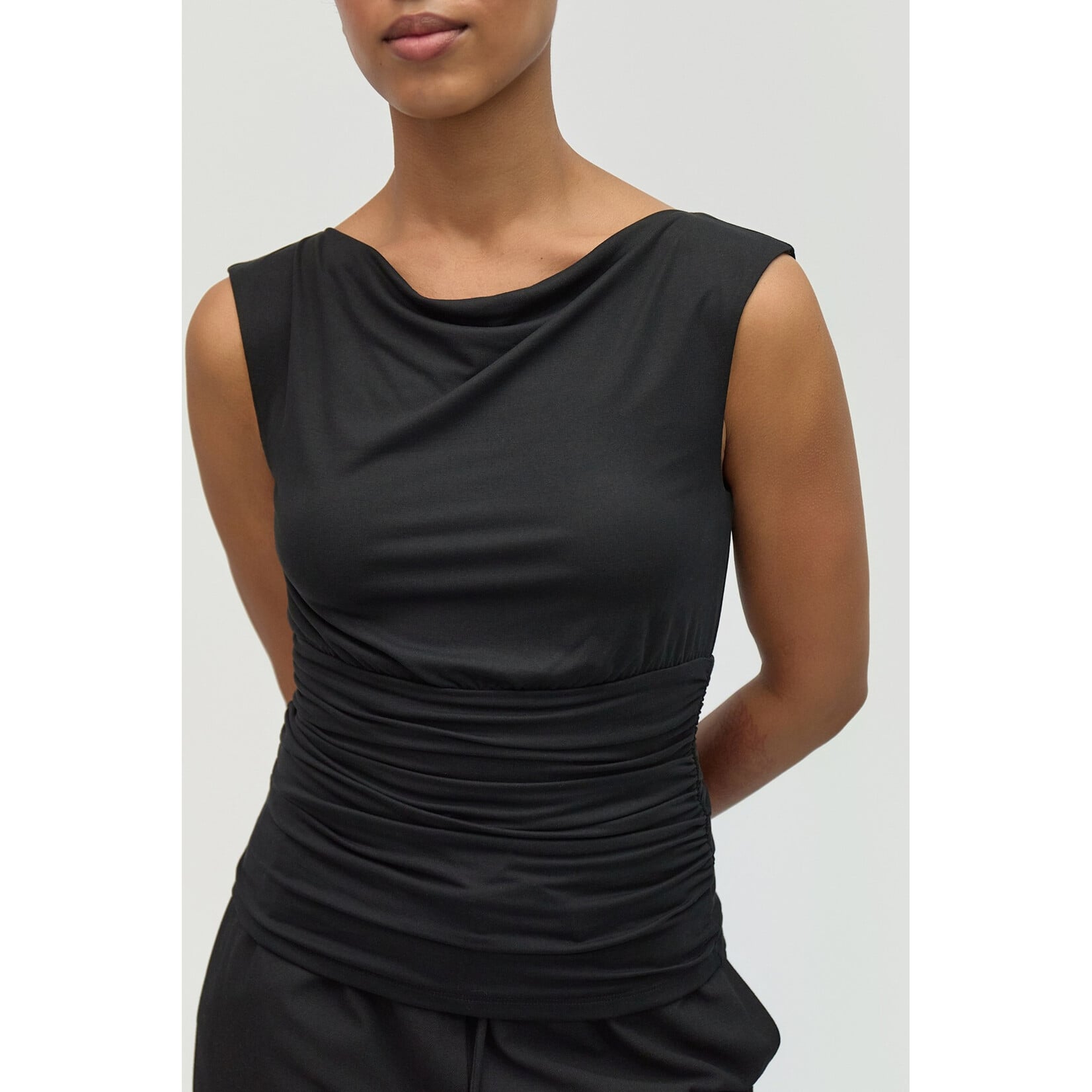 AVAILABLE IN PLUM, BLACK, AND BROWN