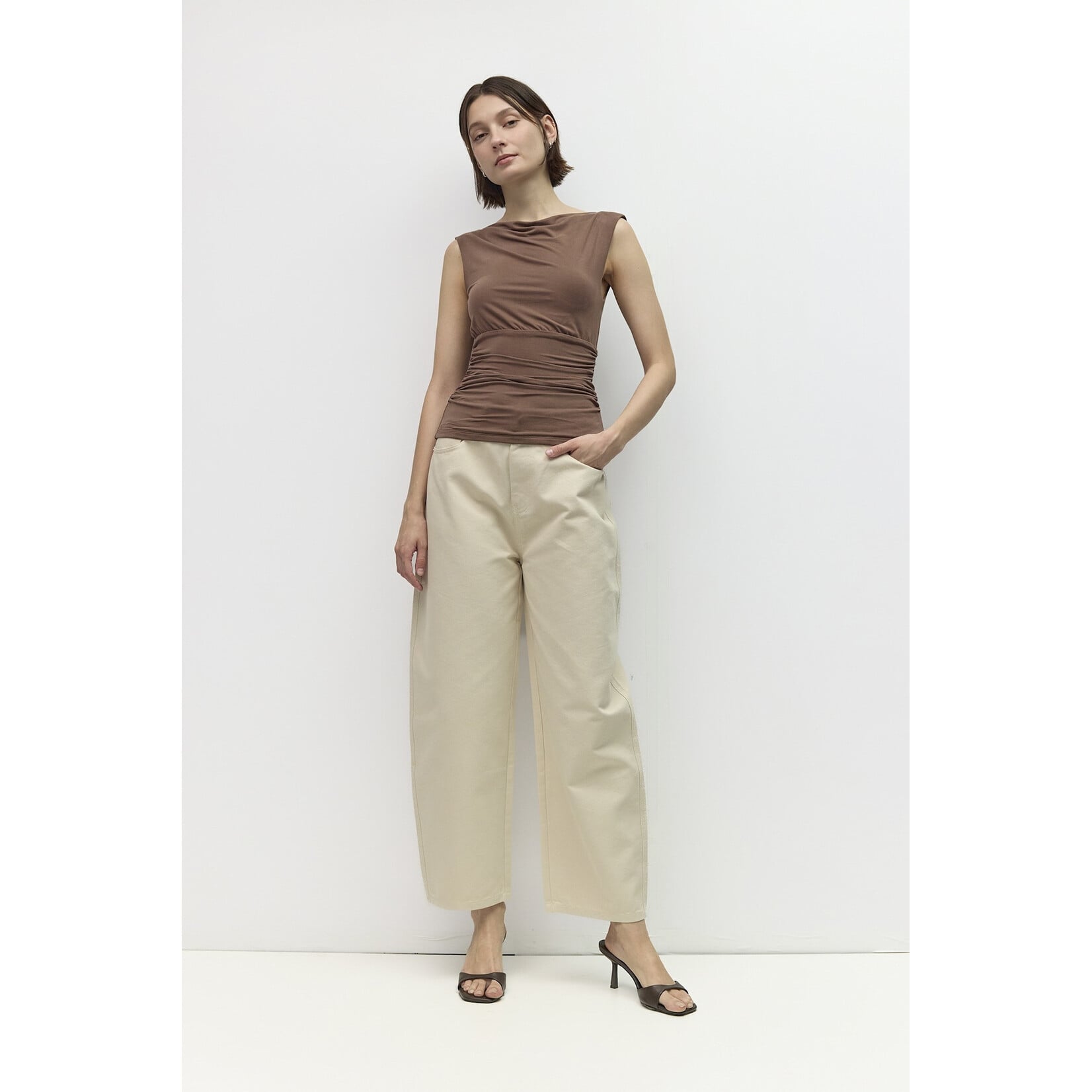 AVAILABLE IN PLUM, BLACK, AND BROWN