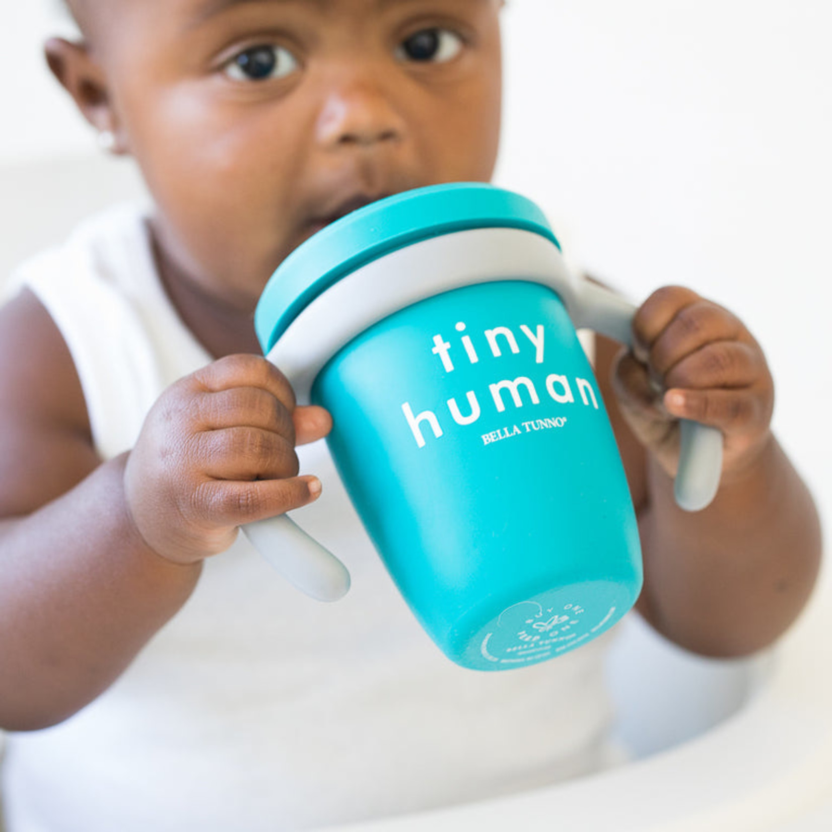 https://cdn.shoplightspeed.com/shops/653227/files/49200193/1652x1652x2/bella-tunno-tiny-human-happy-sippy-cup.jpg