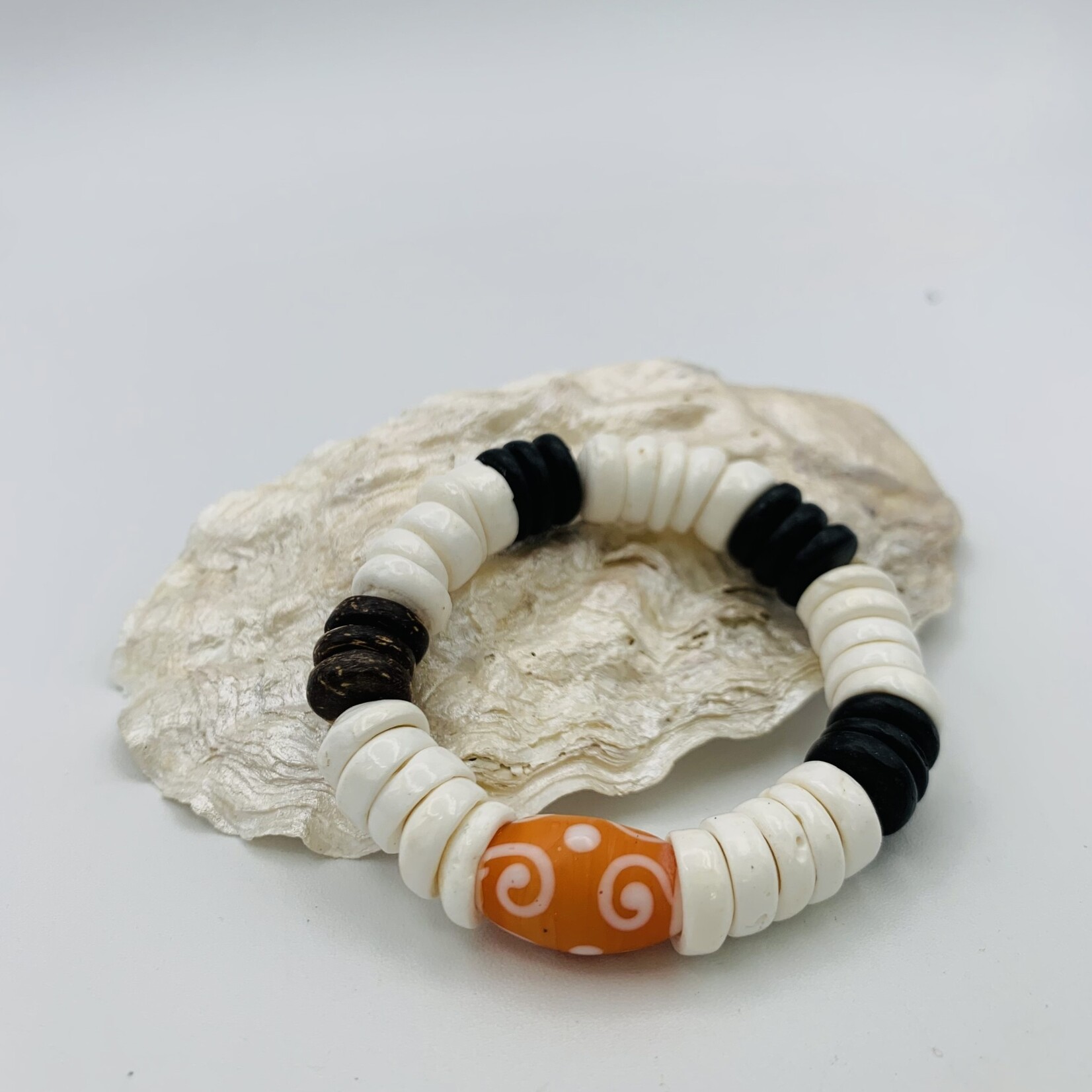 Shell Of A Life Polished Puka + Coconut Beads + Orange Glass Bead Bracelet