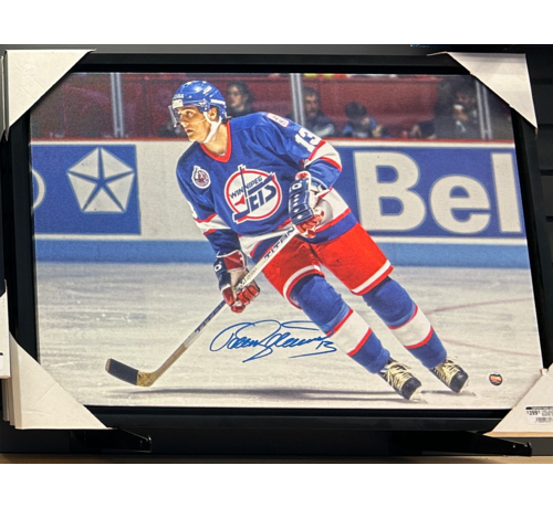 TEEMU SELANNE AUTOGRAPHED WINNIPEG JETS CANVAS (SKATING 2)