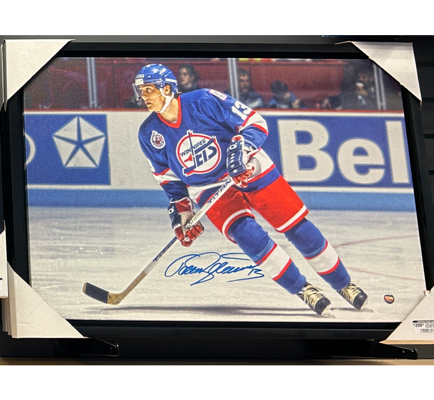 TEEMU SELANNE AUTOGRAPHED WINNIPEG JETS CANVAS (SKATING 2)