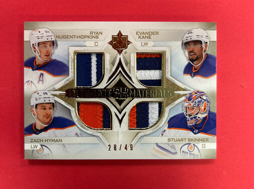 UPPER DECK 2023-24 UPPER DECK ULTIMATE COLLECTION ULTIMATE QUAD MATERIALS OILERS /49