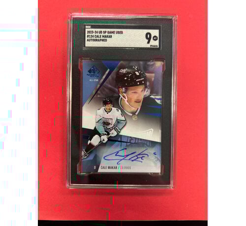UPPER DECK 2023-24 UD SP GAME USED CALE MAKAR BLUE AUTO SGC GRADED 9