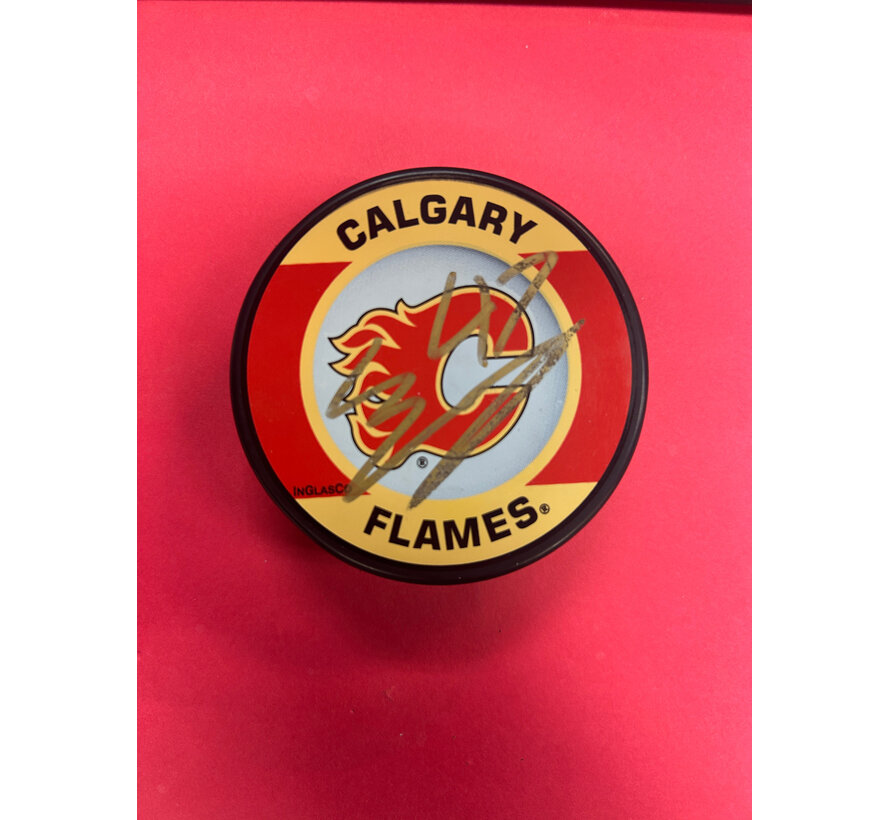 CONNOR ZARY AUTOGRAPHED FLAMES PUCK
