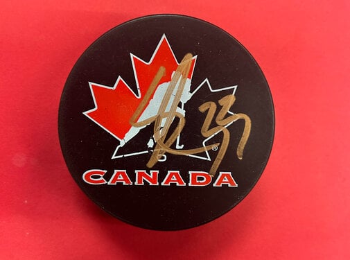 SEBASTIAN COSSA TEAM CANADA AUTOGRAPHED PUCK