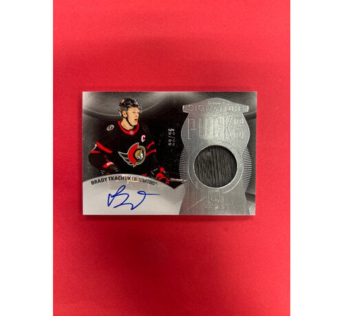 UPPER DECK 2024-25 UPPER DECK THE CUP BRADY TKACHUK SIGNATURE PUCKS /25
