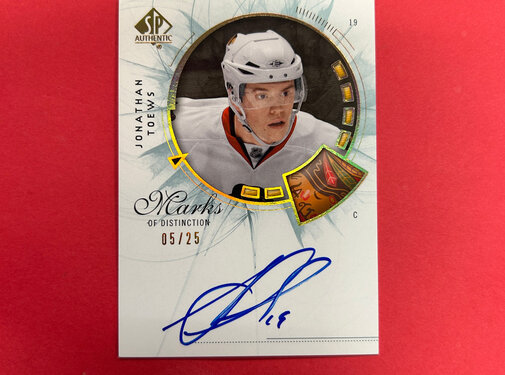 UPPER DECK 2009-10 SP AUTHENTIC JONATHAN TOEWS MARKS OF DISTINCTION /25