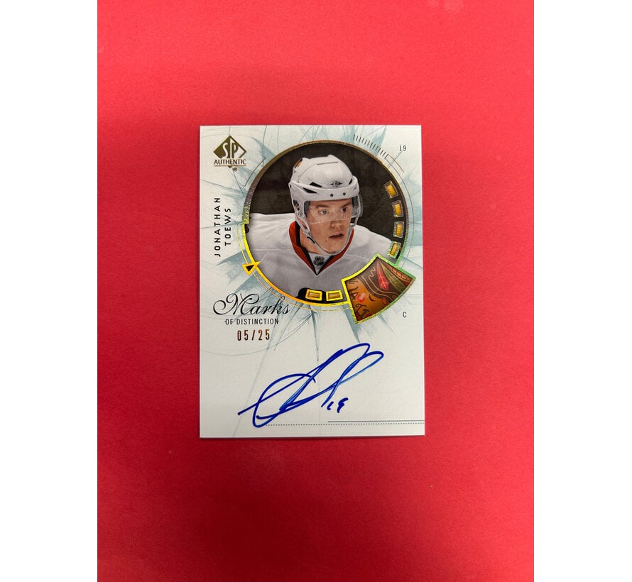 2009-10 SP AUTHENTIC JONATHAN TOEWS MARKS OF DISTINCTION /25