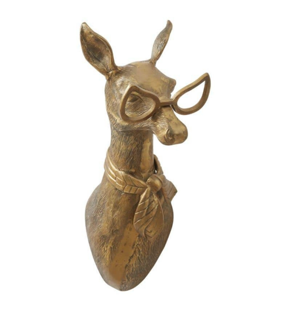 Margaret the Brass Deer figurine mounted on wall