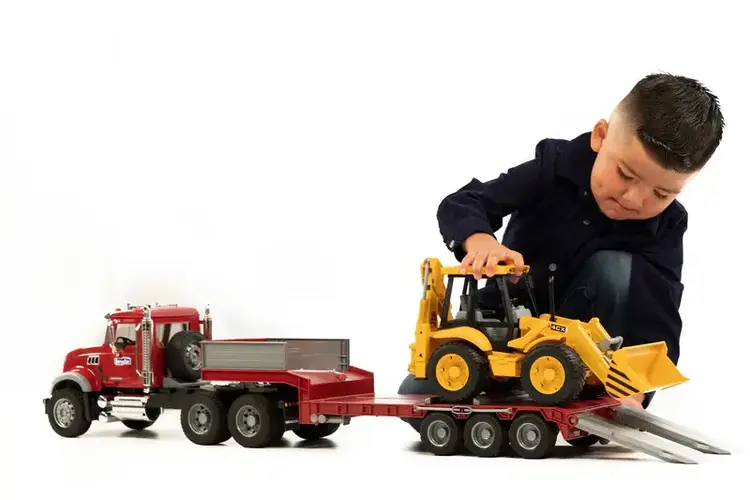 MACK Granite Flatbed with JCB Backhoe Bruder