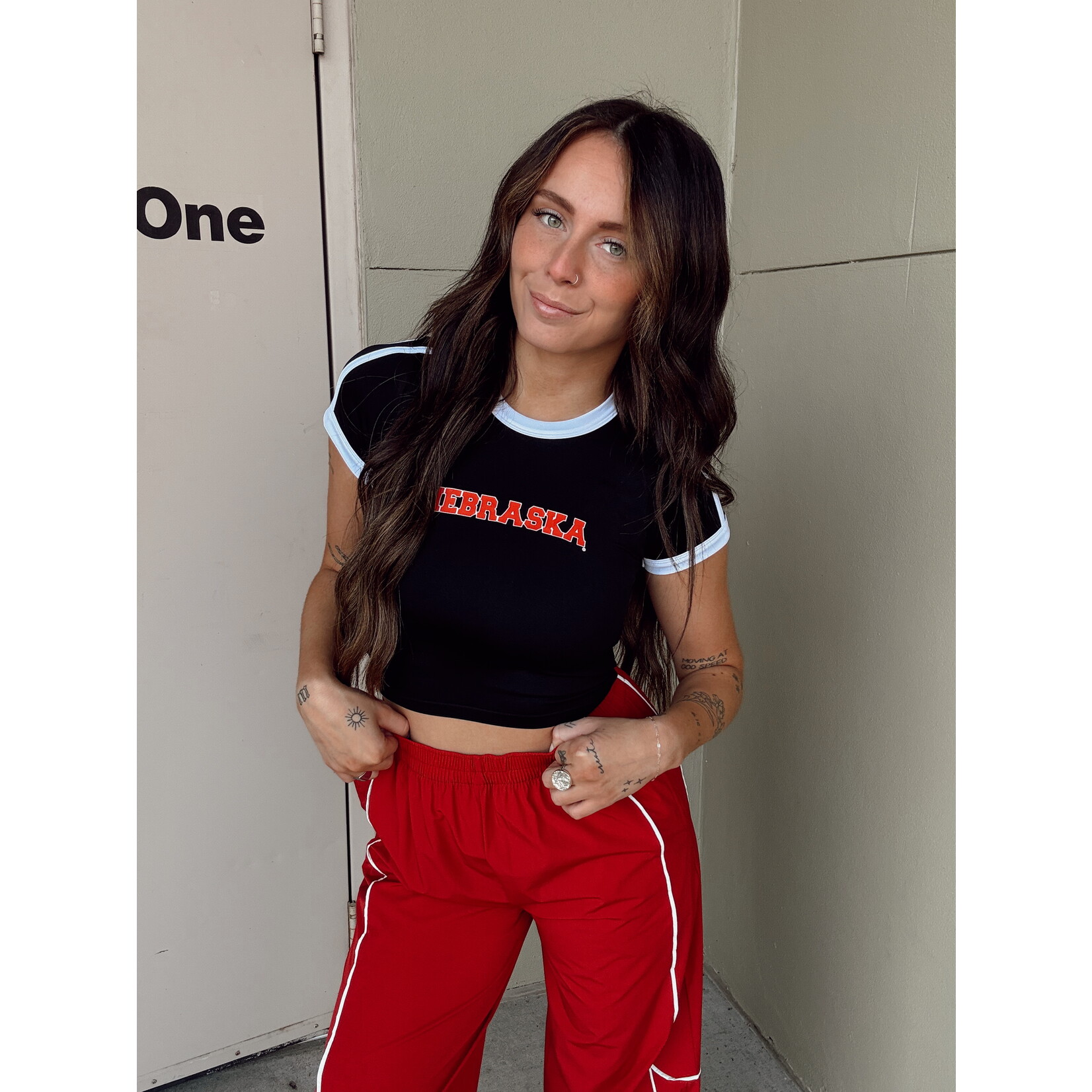 Nebraska Arch Ringer Crop Top