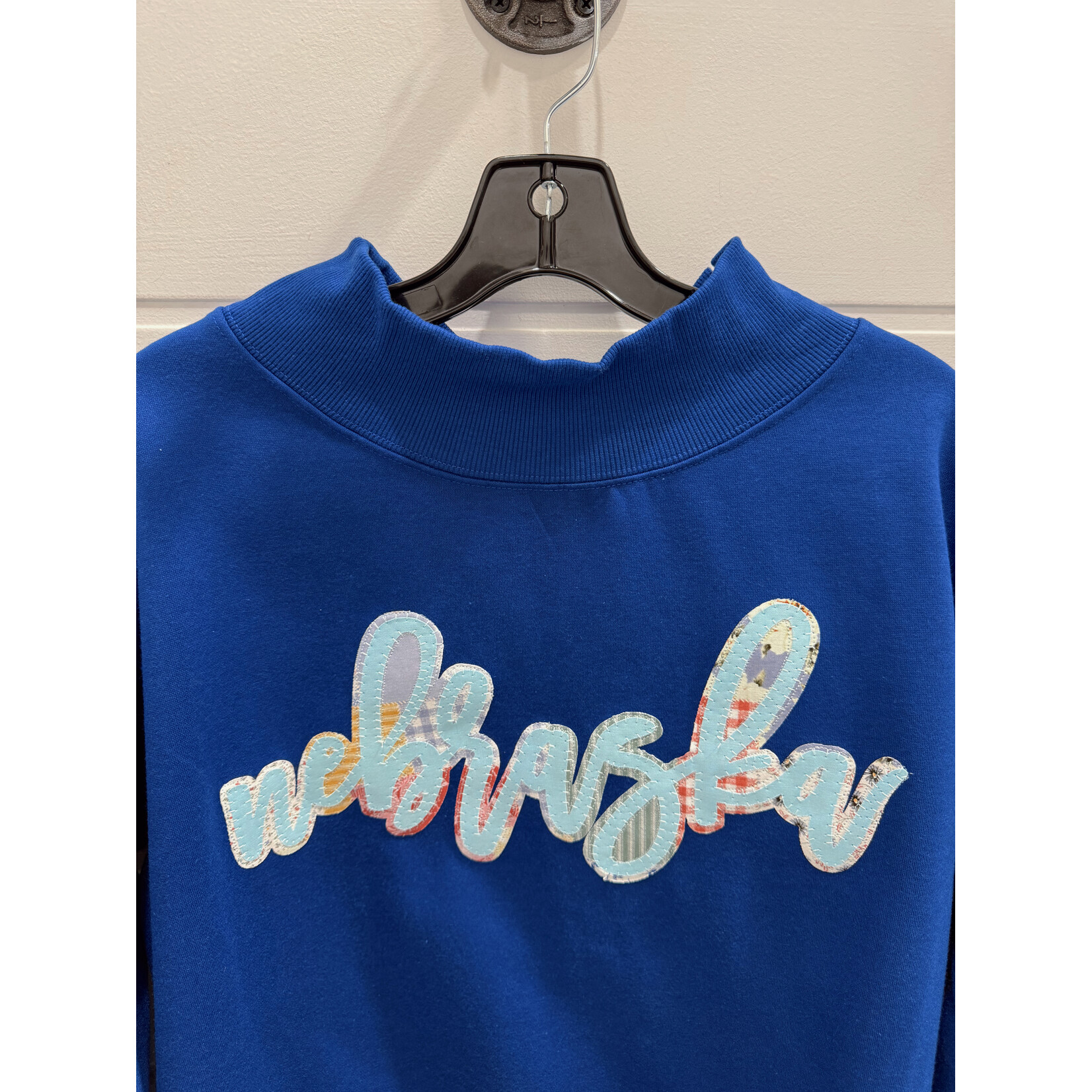 Nebraska Floral Backed Stitch Mockneck