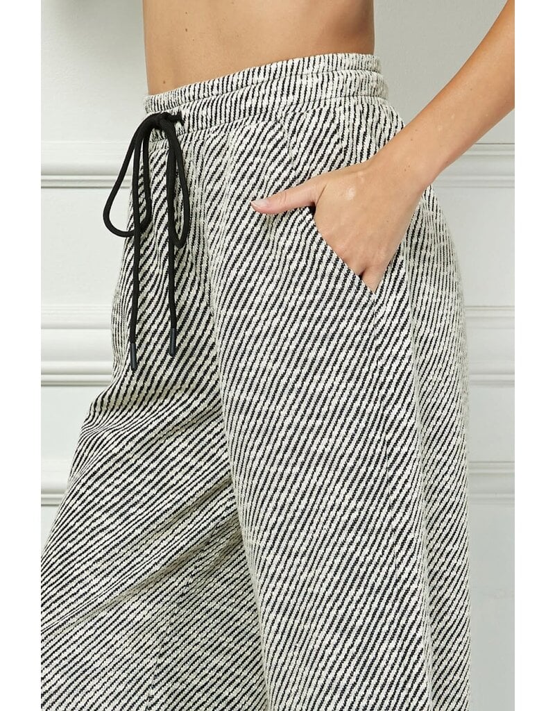 SEE AND BE SEEN DIAGONAL STRIPED CROPPED PANTS