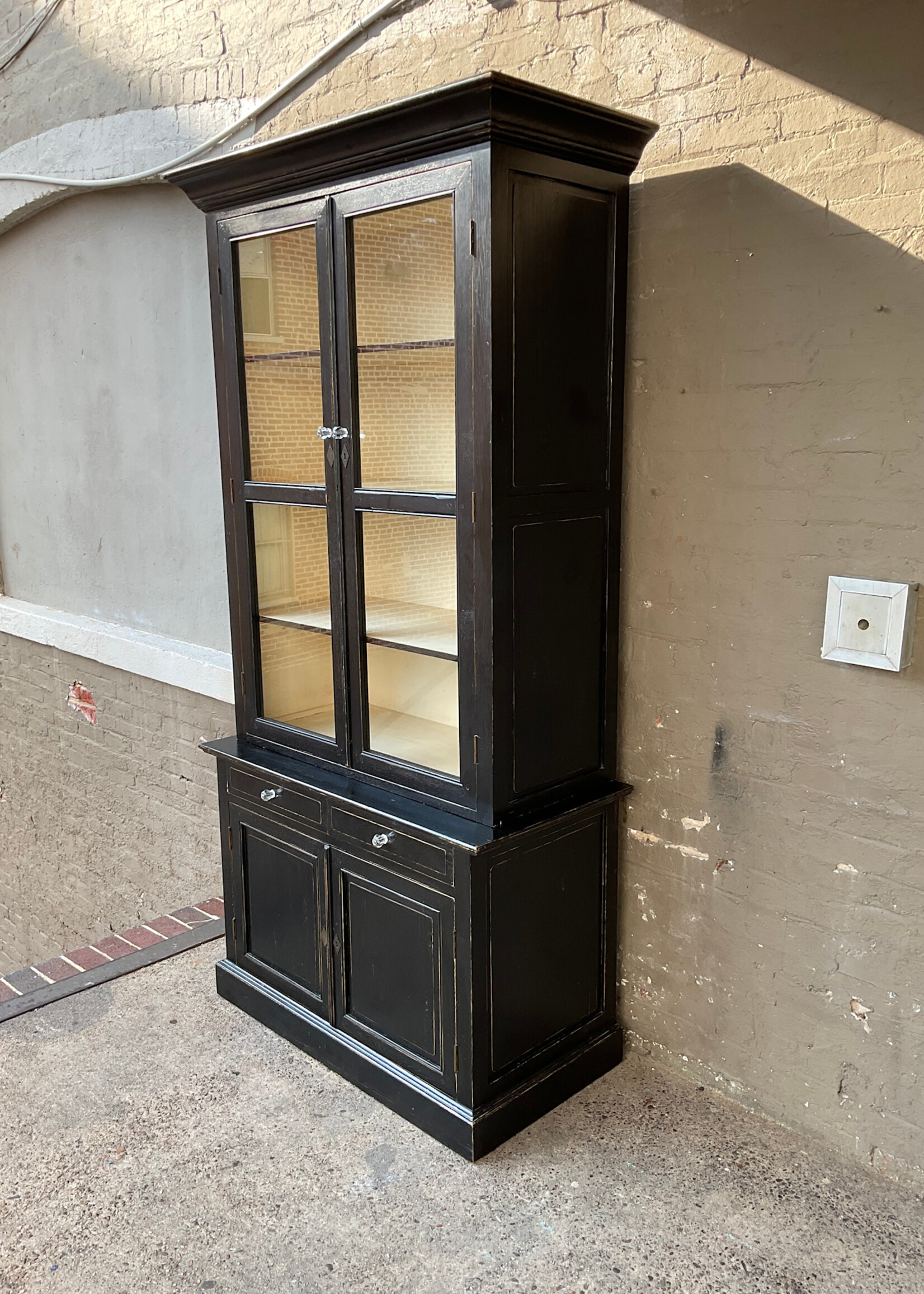 GOODWOOD Four Hands Ebonized Step Back Cabinet