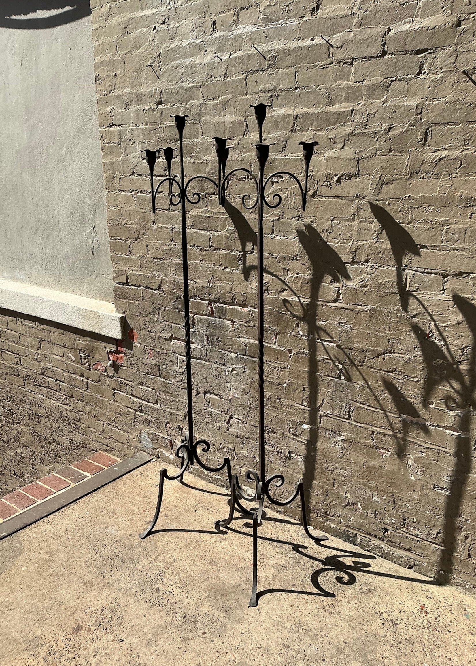 GOODWOOD Pair of Antique Wrought Iron Candle Stands