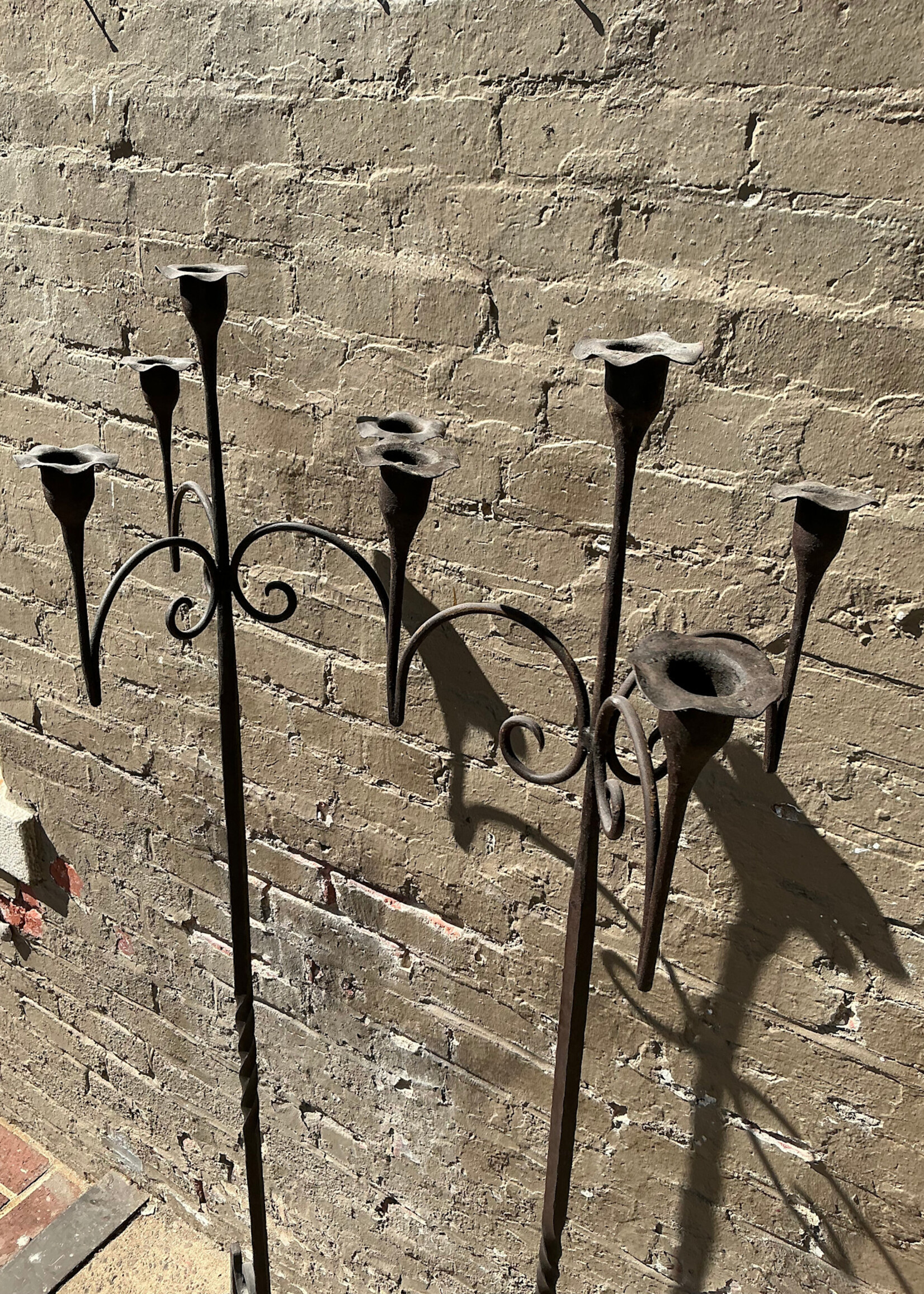 GOODWOOD Pair of Antique Wrought Iron Candle Stands