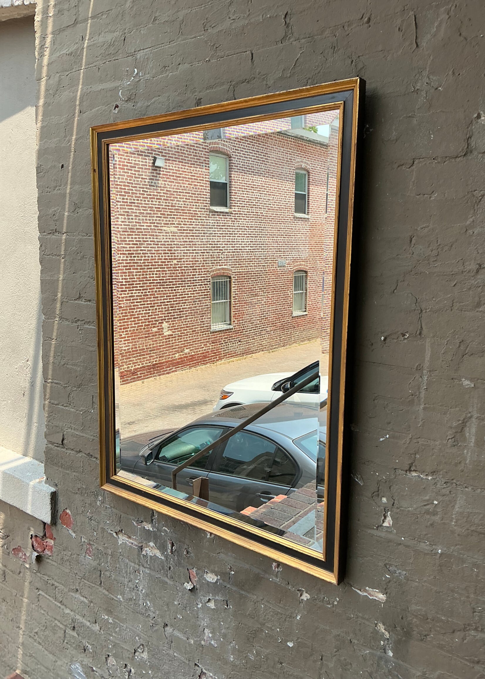 GOODWOOD Parital Gilt and Ebonized Mirror, Scratched