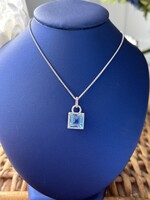 Jordans Blue Topaz and Diamond Necklace 14kwg 18in Chain