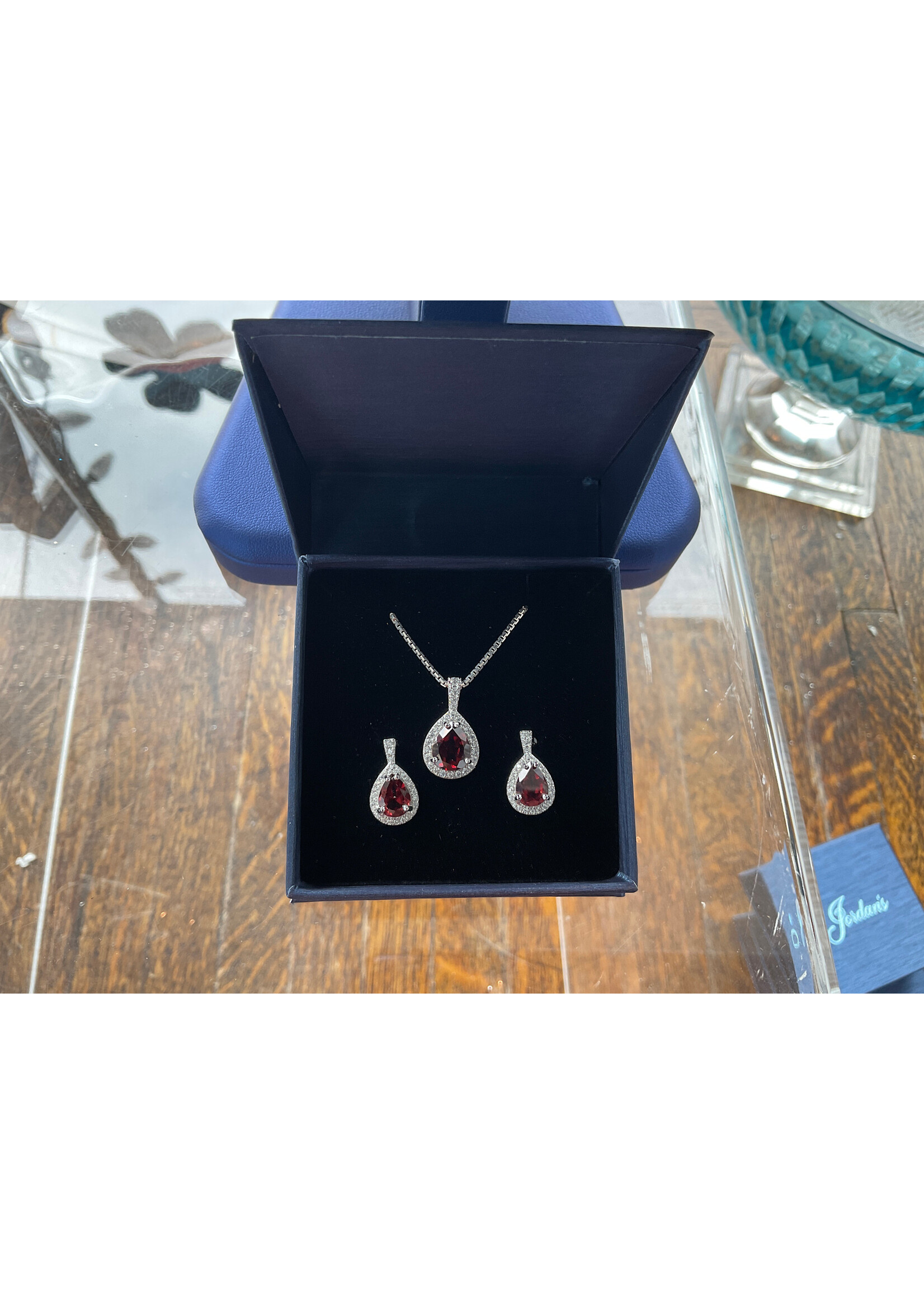 Jordans Gen Garnet and CZ Halo Set Sterling