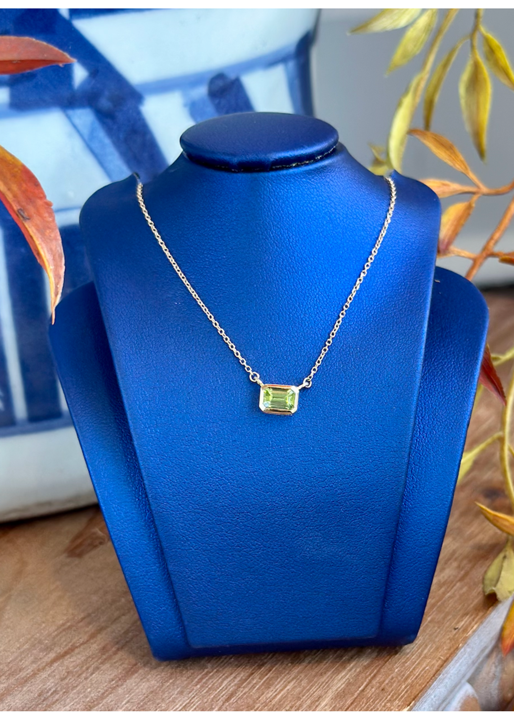 Jordans .47ct Bezel Set Emerald Cut Peridot 10k adj chain