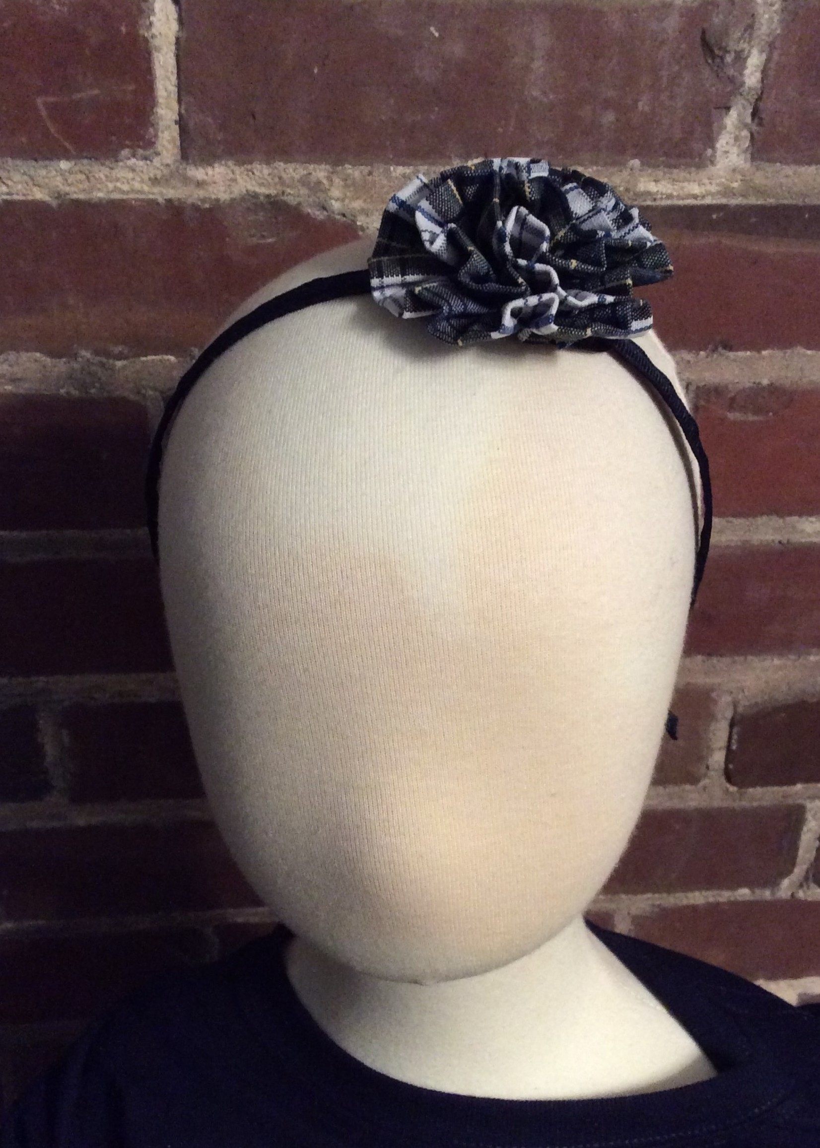 SMALL PLAID ROSETTE ATTACHED TO A  NAVY HEADBAND