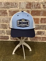 THE GAME ADULT TRUCKER HAT IN COLUMBIA BLUE WITH NAVY ROPE AND FRONT PATCH