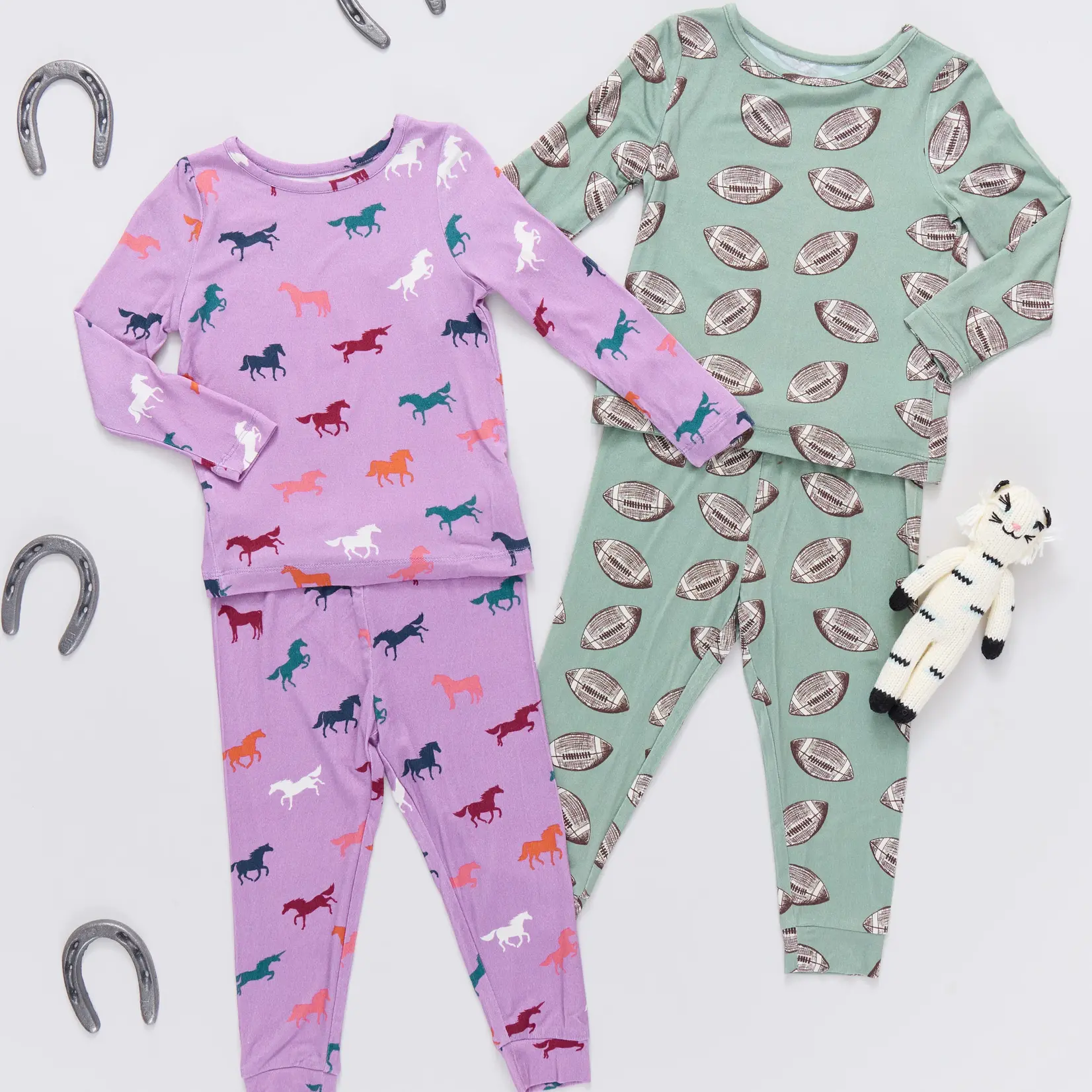 Pink Chicken kids bamboo pj set - green flying footballs