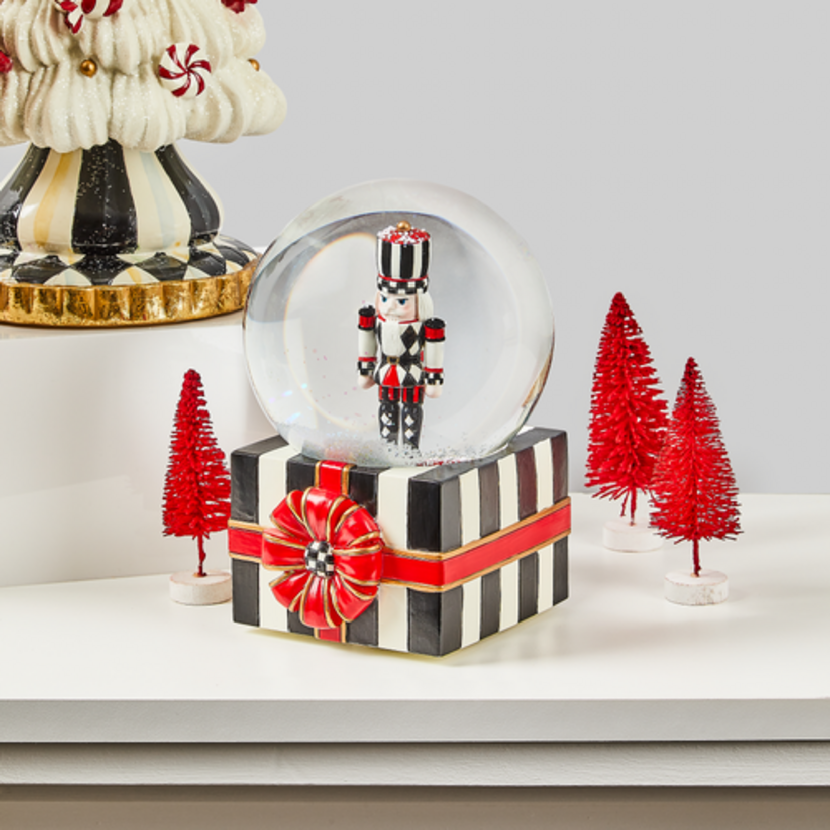 MacKenzie-Childs nutcracker gift snow globe