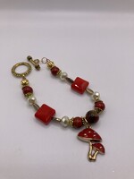 Our Twisted Dahlia Golden Red Mushroom with center bead of Jasper