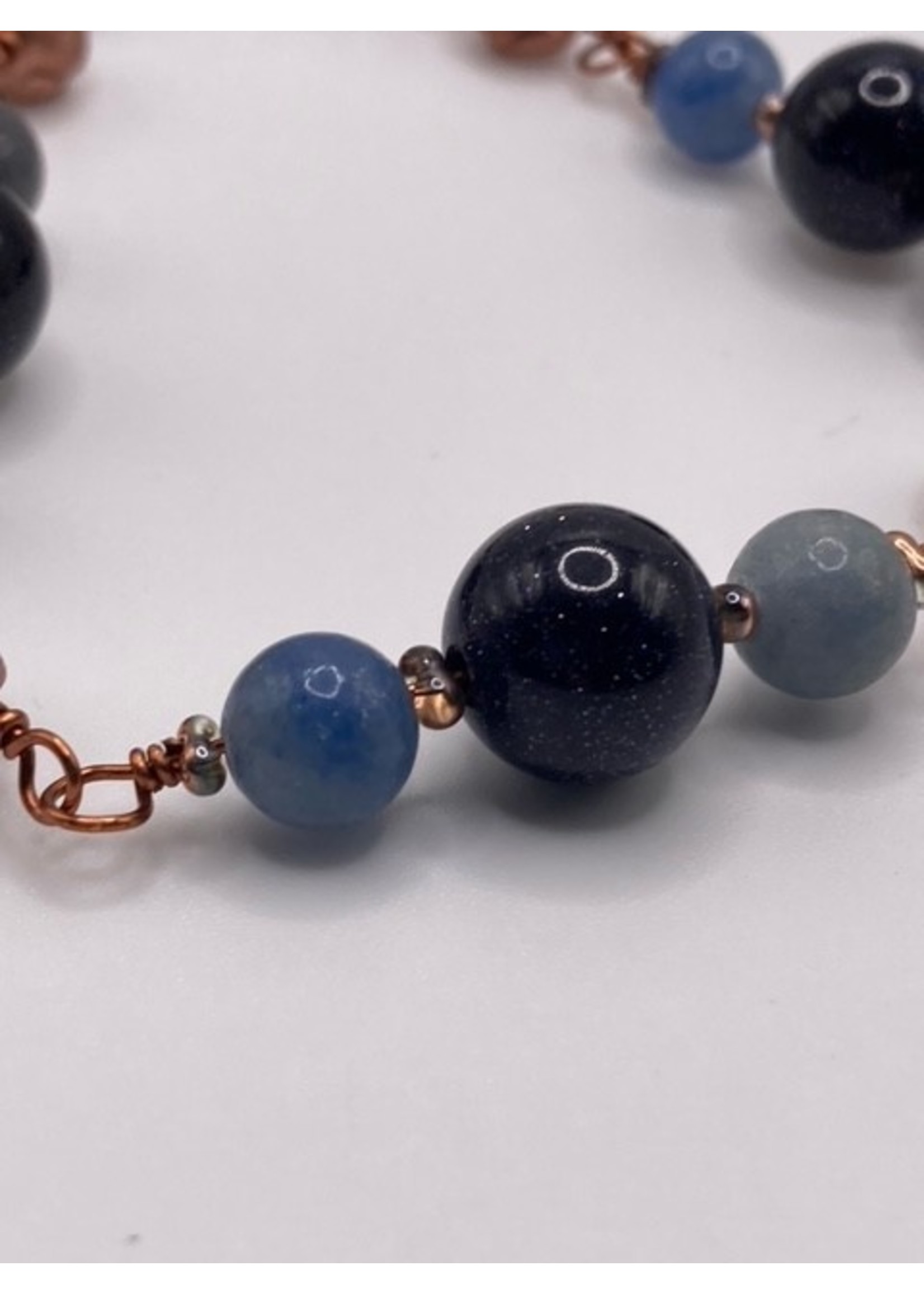 Our Twisted Dahlia Blue and Copper Hand wrapped wire with Glass spacer beads