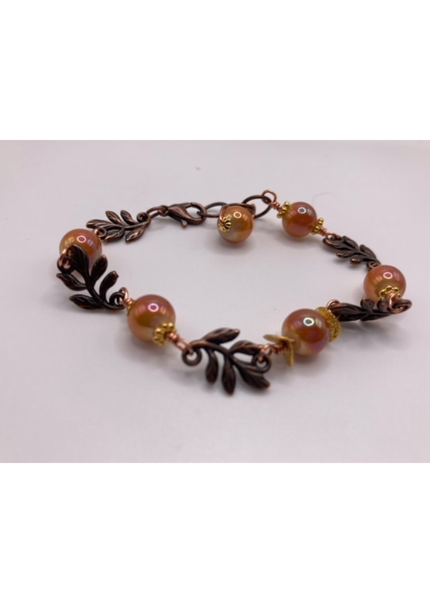 Bronze Leaf Bracelet with Gold spacer Beads and Orange Pearl Sheen