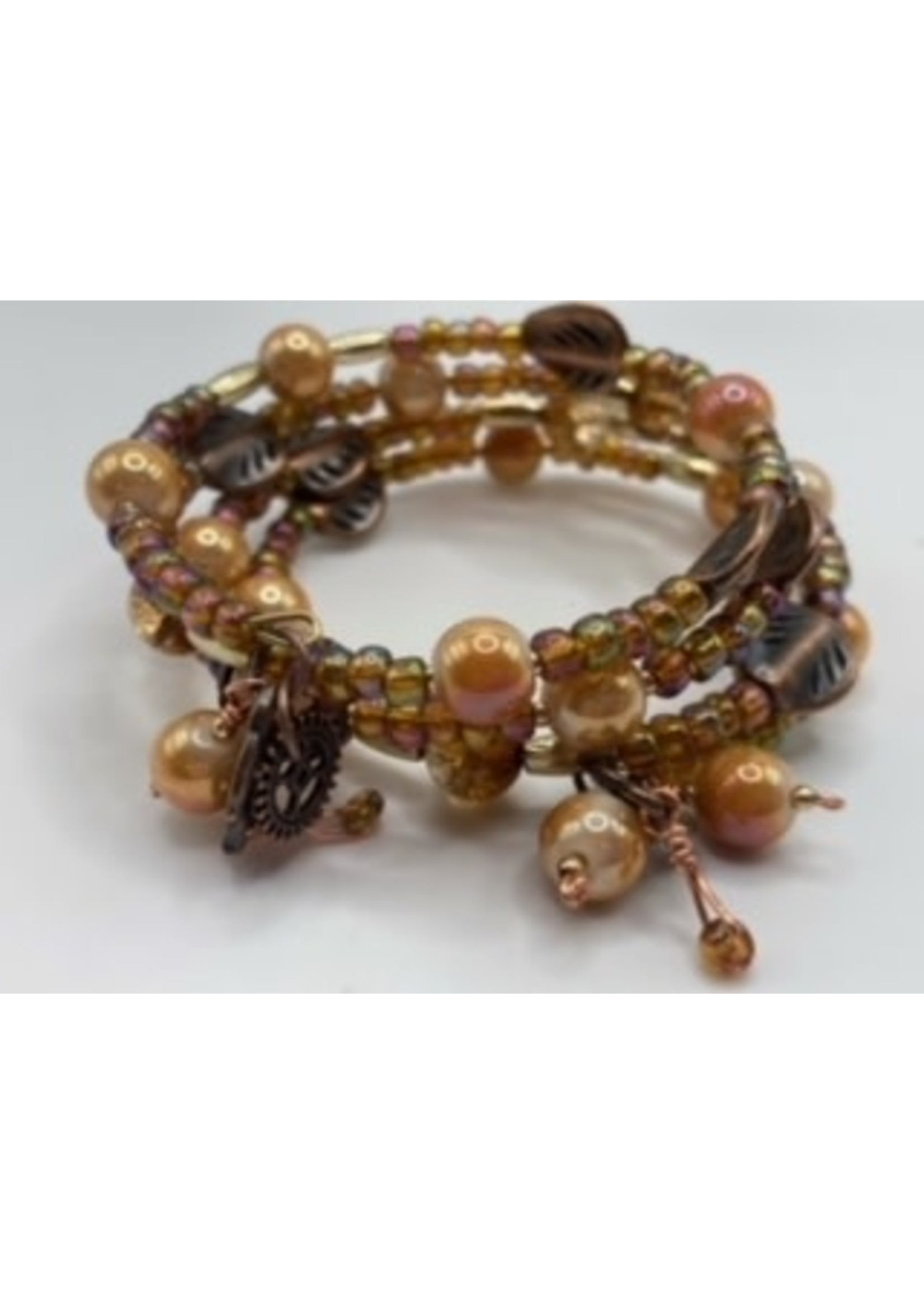 Our Twisted Dahlia 3 Wrap Bracelet in Iridescent Earth Tone Colors with Bronze leaves