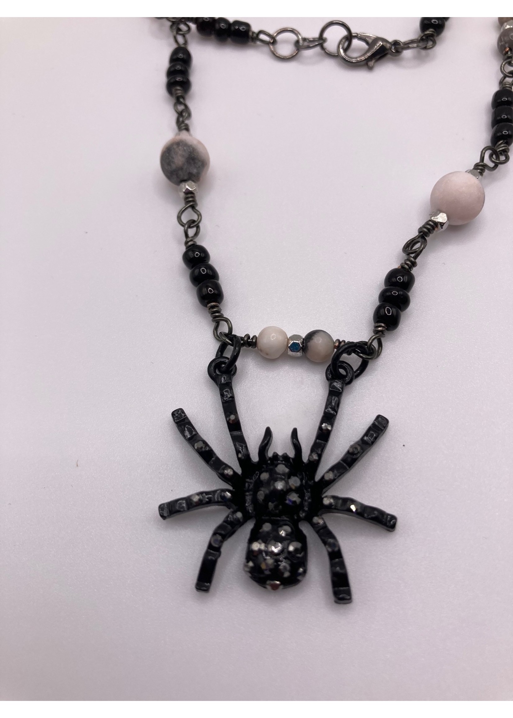 Our Twisted Dahlia Pink Zebra Jasper, Black Seed Beads, and Black Spider with Rhinestone Necklace