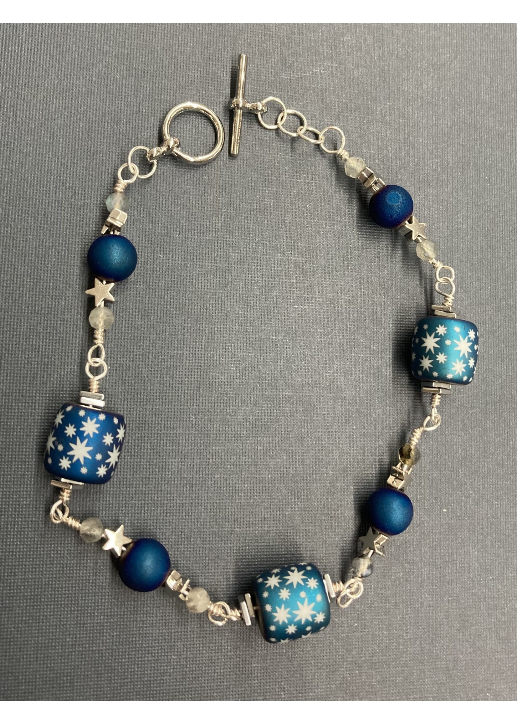 Our Twisted Dahlia B006 Iridescent Blue Barrel Beads with Stars, Hematite, Labradorite Beads, and Silver Star Bracelet