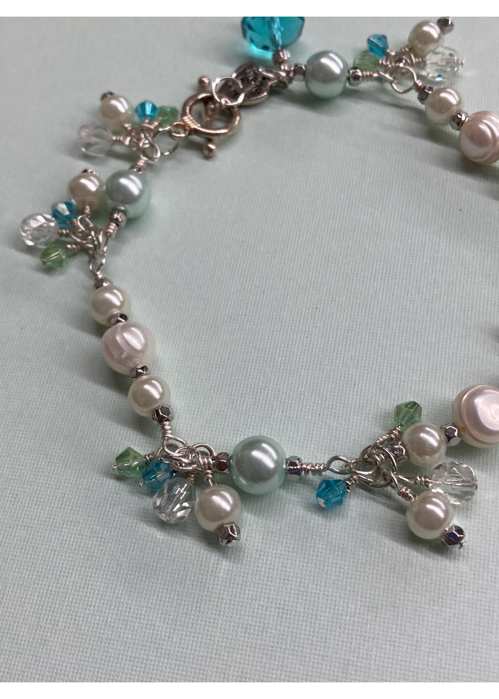 Our Twisted Dahlia B009 Freshwater Pearls with Shades O Turquoise Crystal Bracelet with Silver Wire