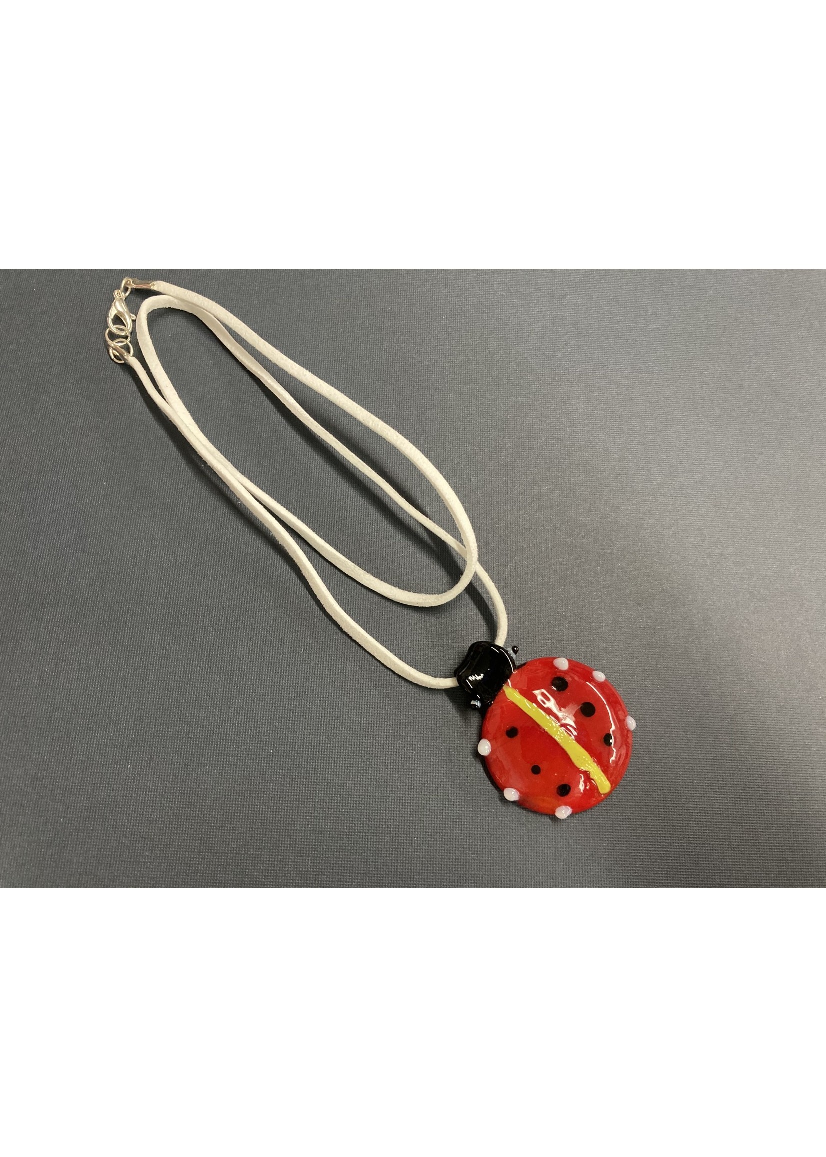 Our Twisted Dahlia N217 Hand Made Glass Ladybug Pendant with a Suede Necklace